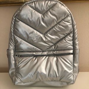 Caraa x Athleta silver quilted backpack